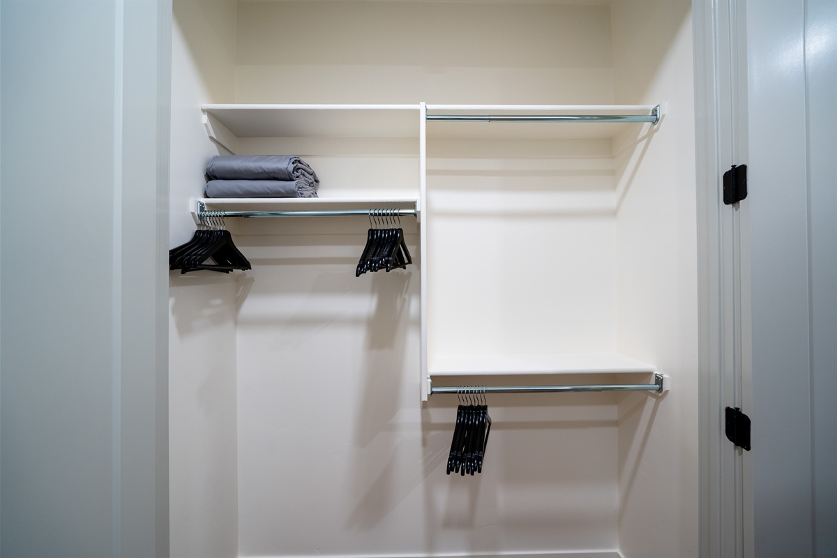 Closet with shelving and hanging space — unpack and settle in.
