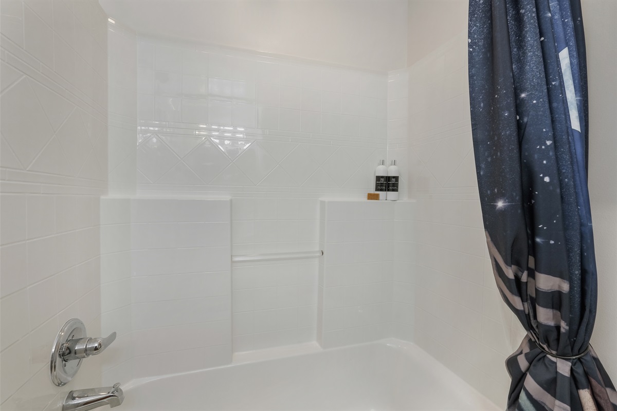 Additional lower-level bathroom offering convenience for larger groups.