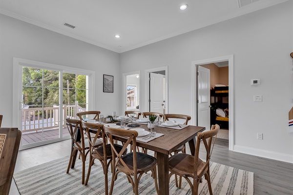 Welcome to our spacious dining area, where gatherings are made memorable. Our large dining table comfortably accommodates 8, offering the perfect setting for shared meals and conversations. Come together and create cherished moments in this inviting space.