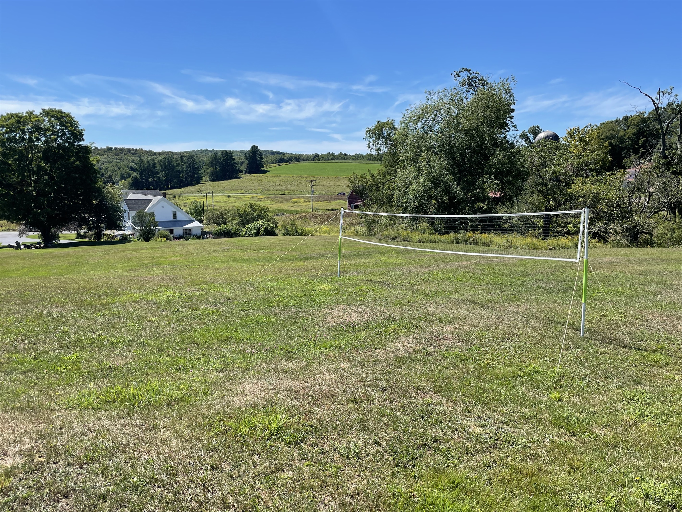 Volleyball net on hill above Peterson Place