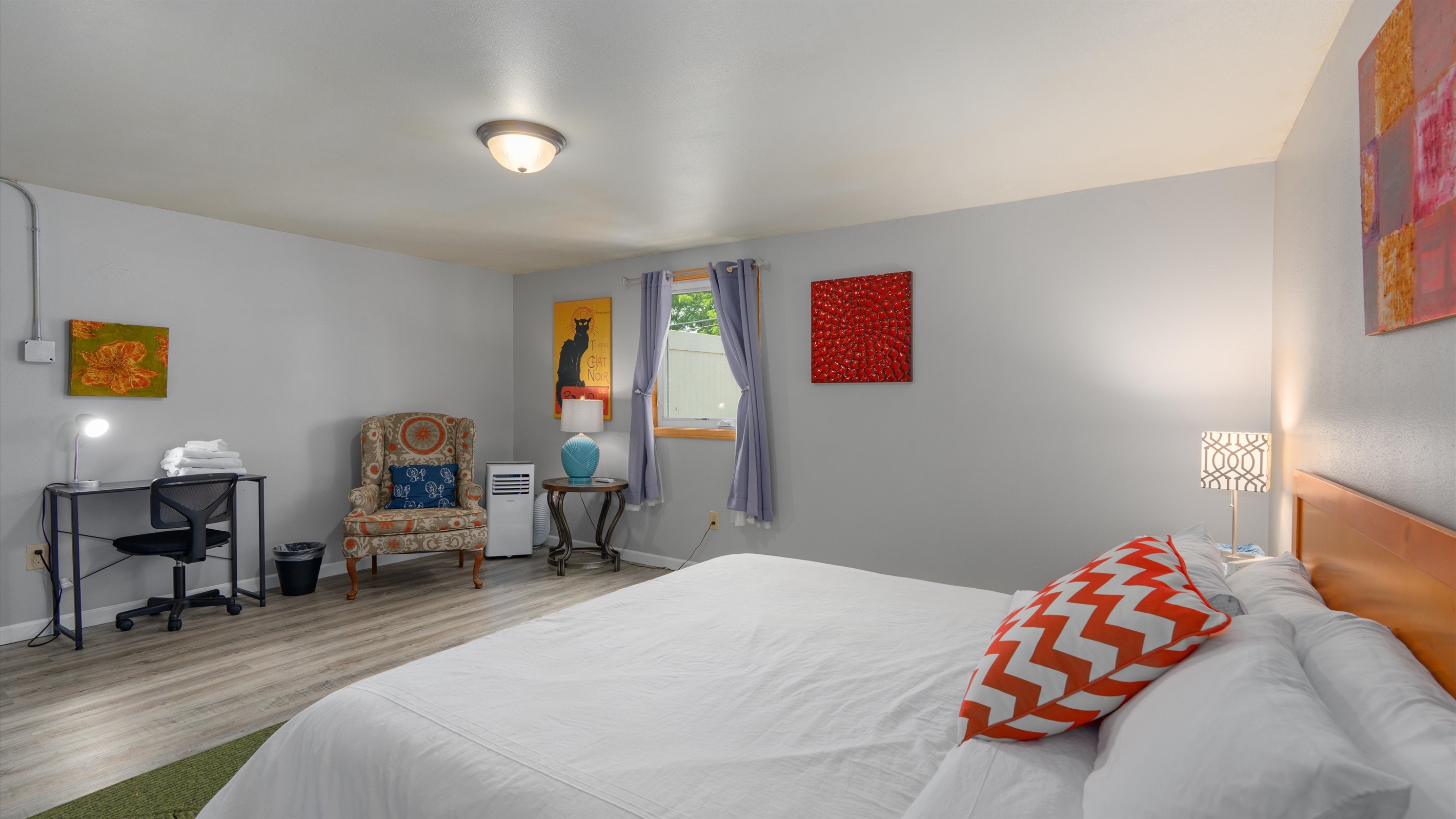 Eclipse's lower bedroom offers a great king bed, small writing area and nice AC off the patio area.