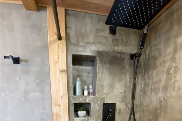 Rainfall shower head. Smart phone compatibility to the bluetooth speaker in the ceiling shower light. 