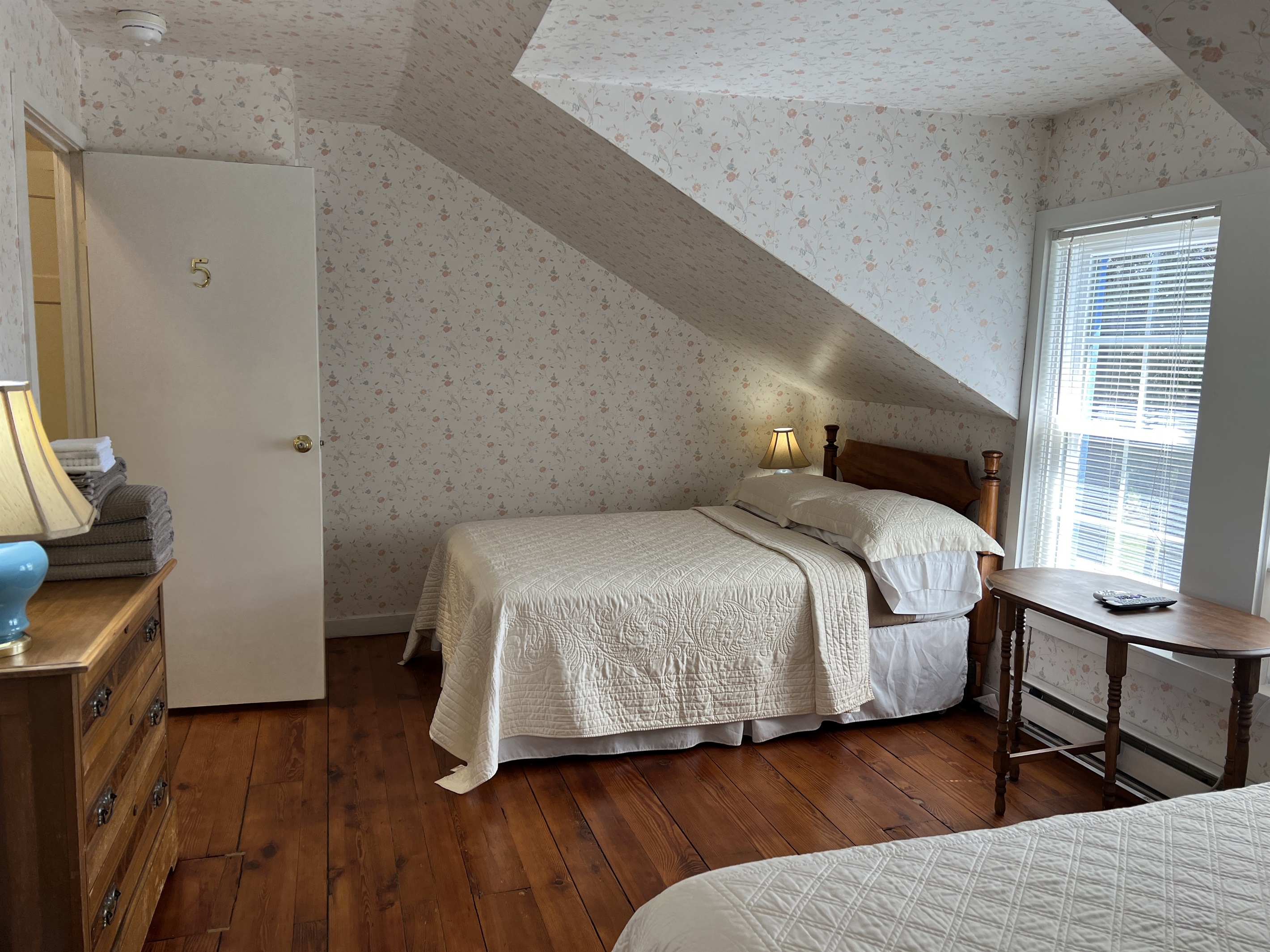2nd floor family suite bedroom #5 w/ double bed and queen bed.