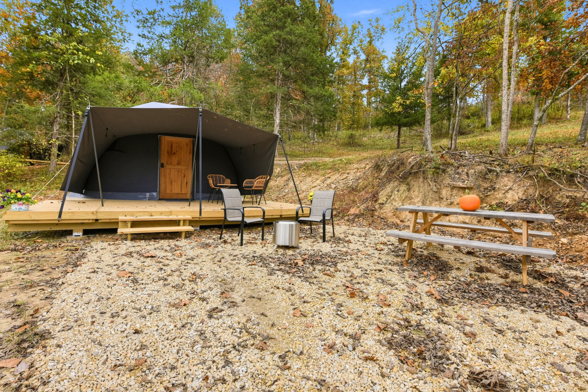 Enjoy the outdoors with your own fire pit, seating area, and picnic table.