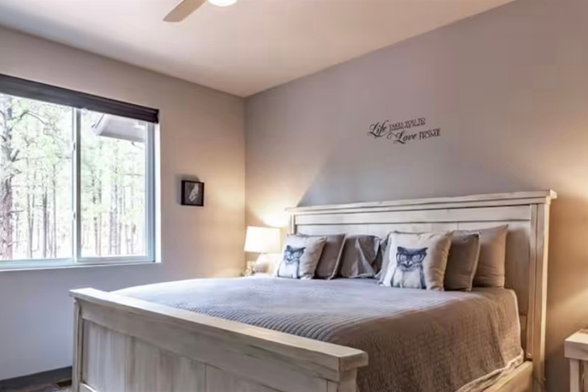 Additional king bedroom with simple, relaxing design.