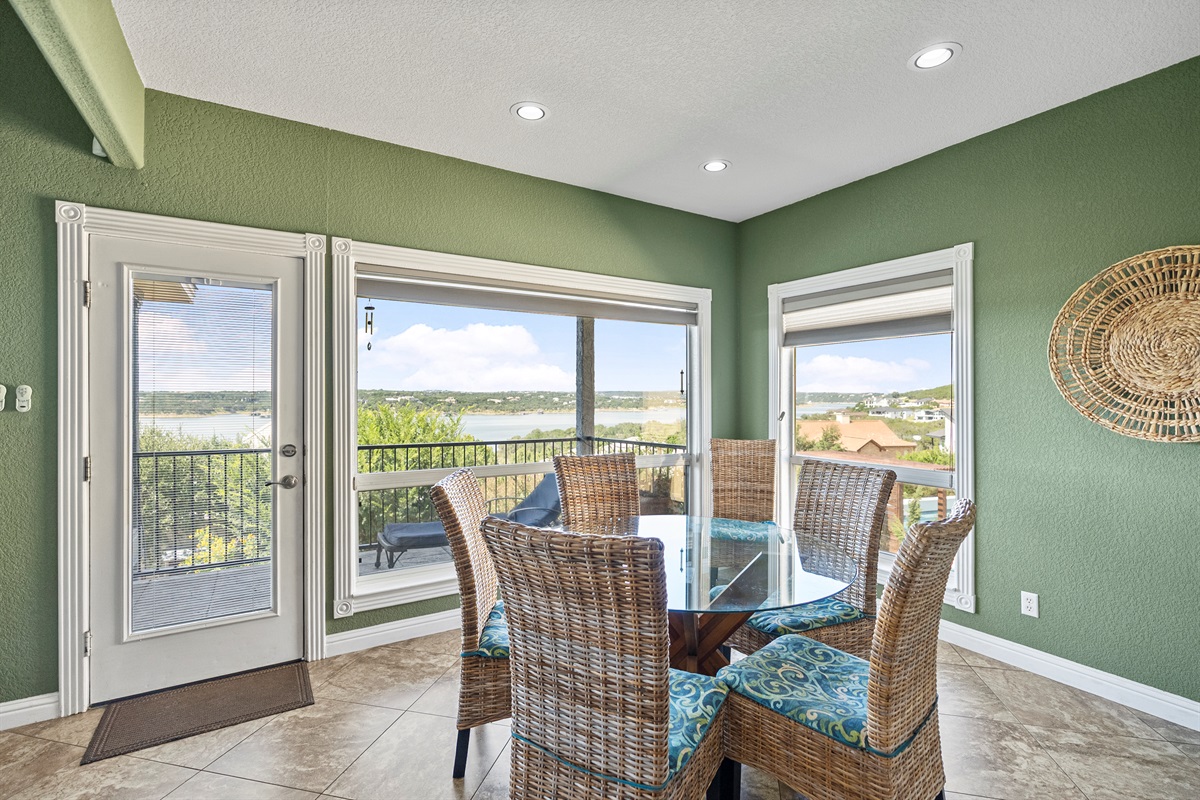 Cozy dining space off the kitchen with stunning Lake Travis views, perfect for morning coffee or casual meals.