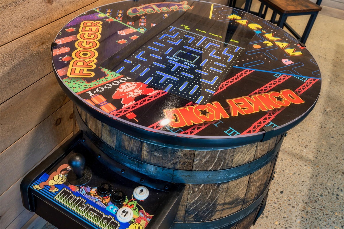 Our barrel arcade is a fan favorite and loaded with over 60 classic games!