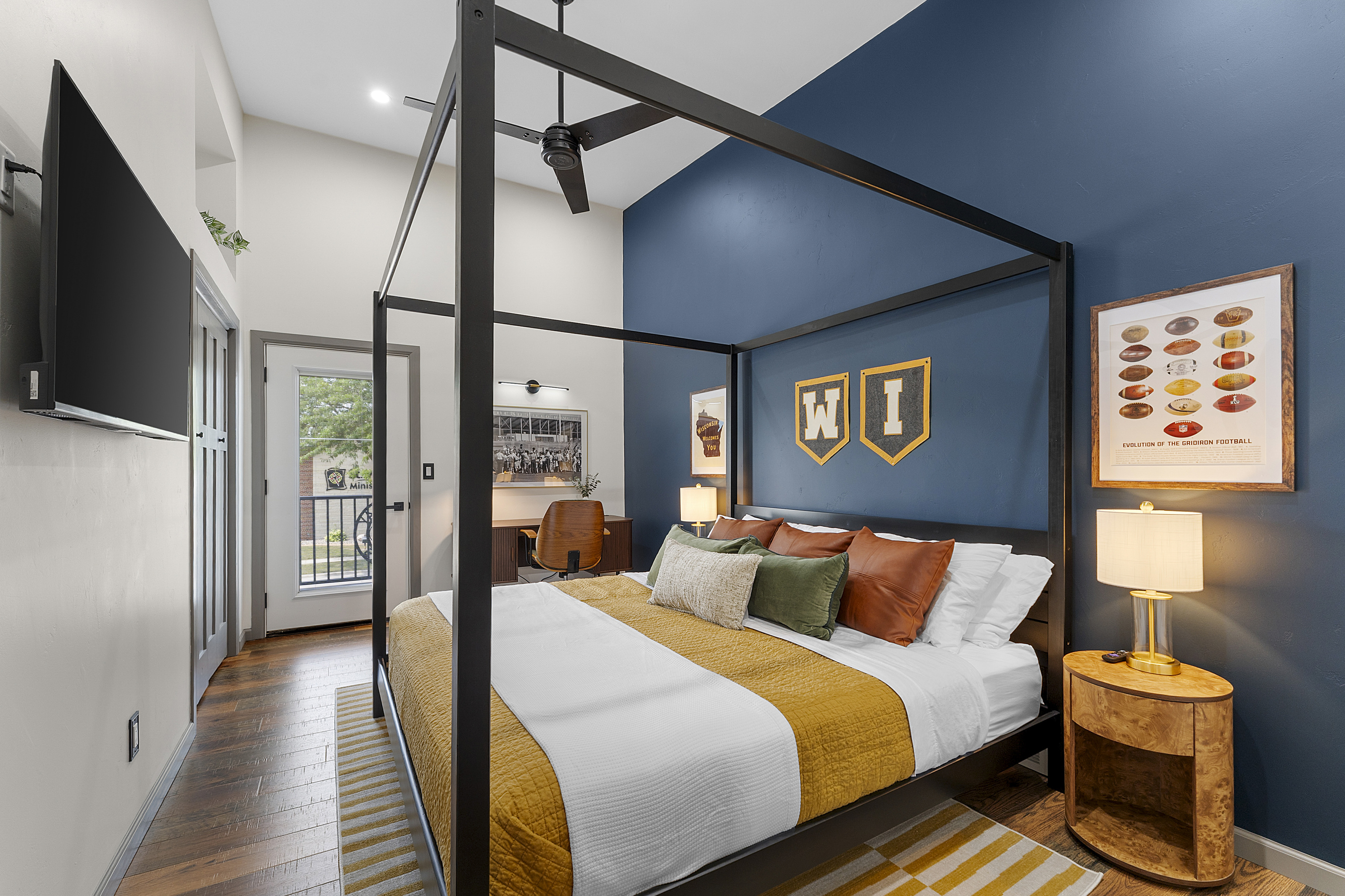 King bedroom with premium bedding, Smart TV and dedicated workspace.