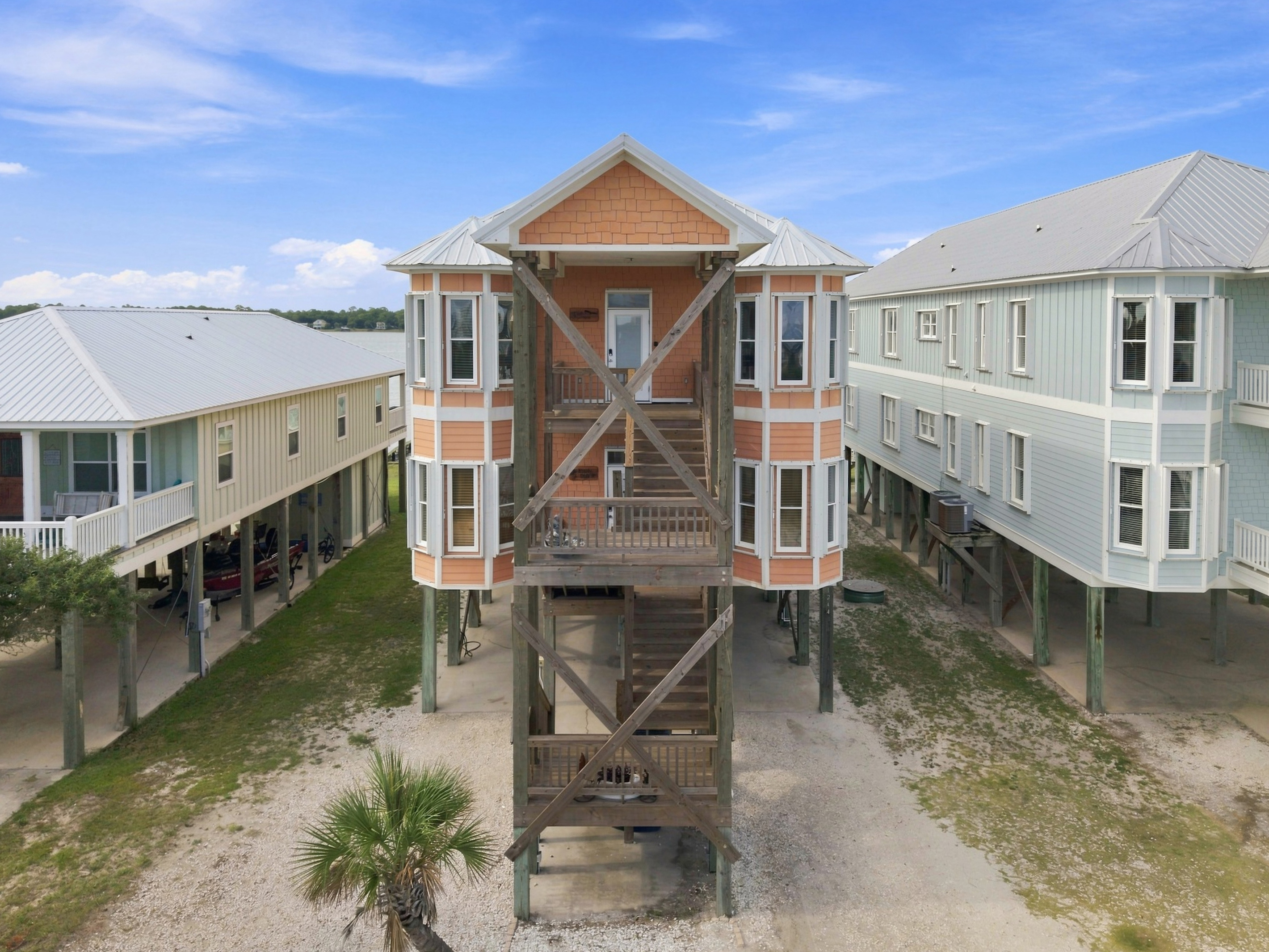 Striking multi-level elevation with covered parking below