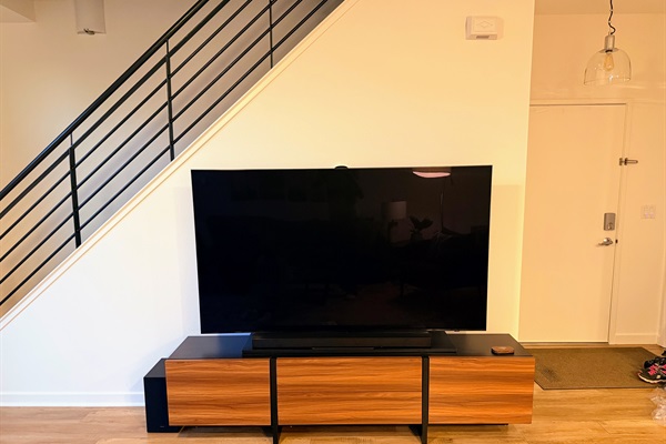 Large 4K TV in main living space.