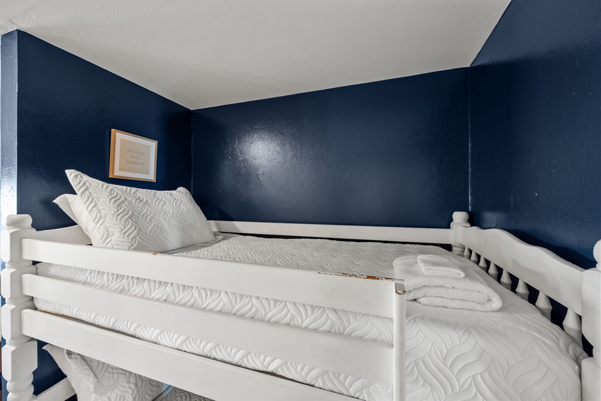 Modern coastal loft with comfy bedding
