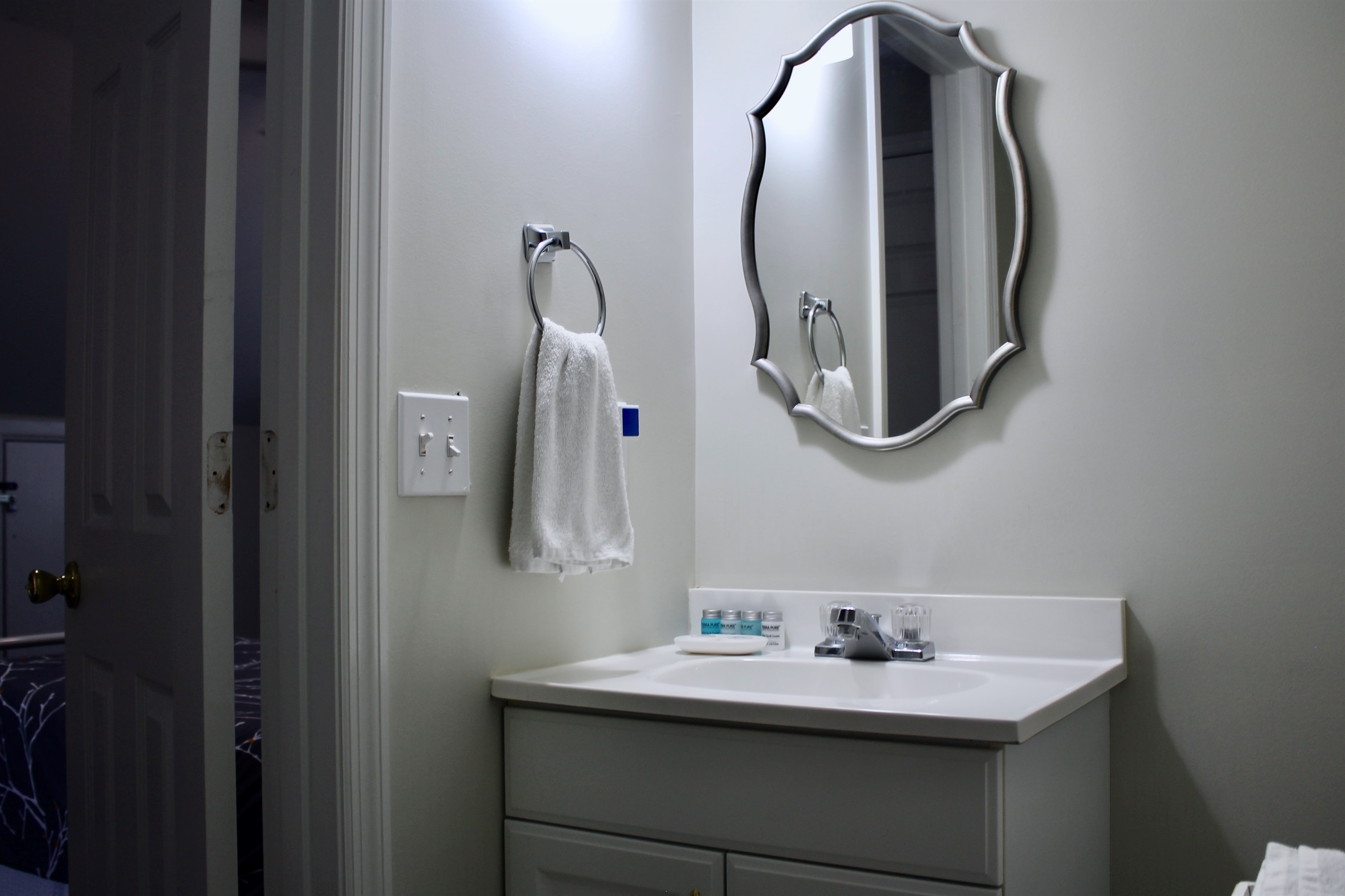 A stylish half bath in the loft—perfect for convenience and privacy.