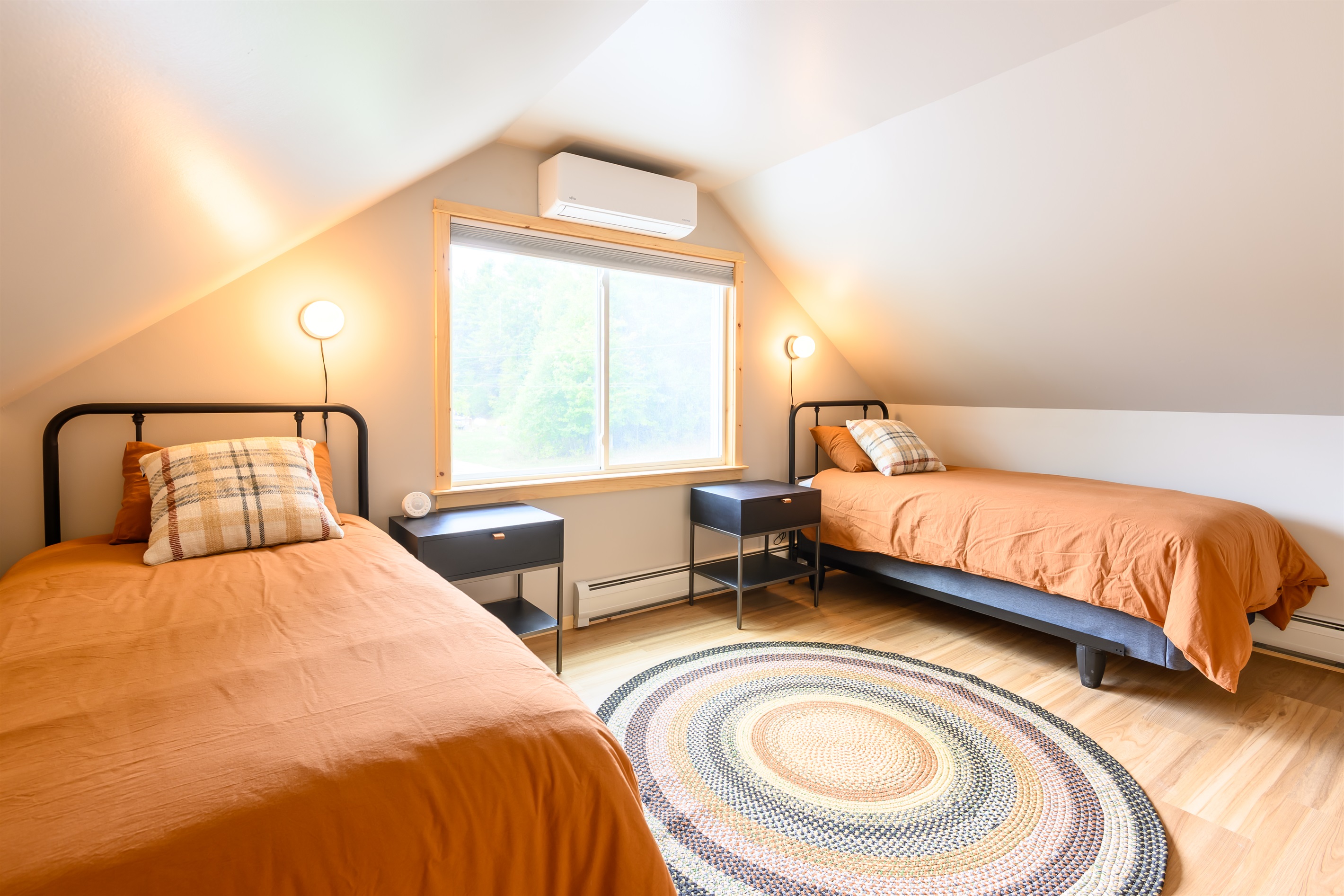 Upstairs, the additional upstairs bedroom features 2 twin XL helix midnight luxe mattresses