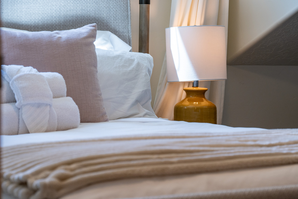 Thoughtful bedroom details add an extra layer of comfort to your mountain stay.