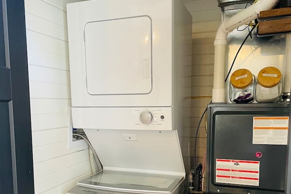 This treehouse has a stacked washer and dryer available for guests to use. 