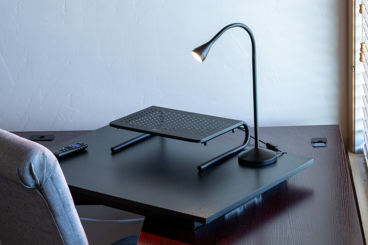Dedicated workspace with desk lamp and room to stay productive during your stay.