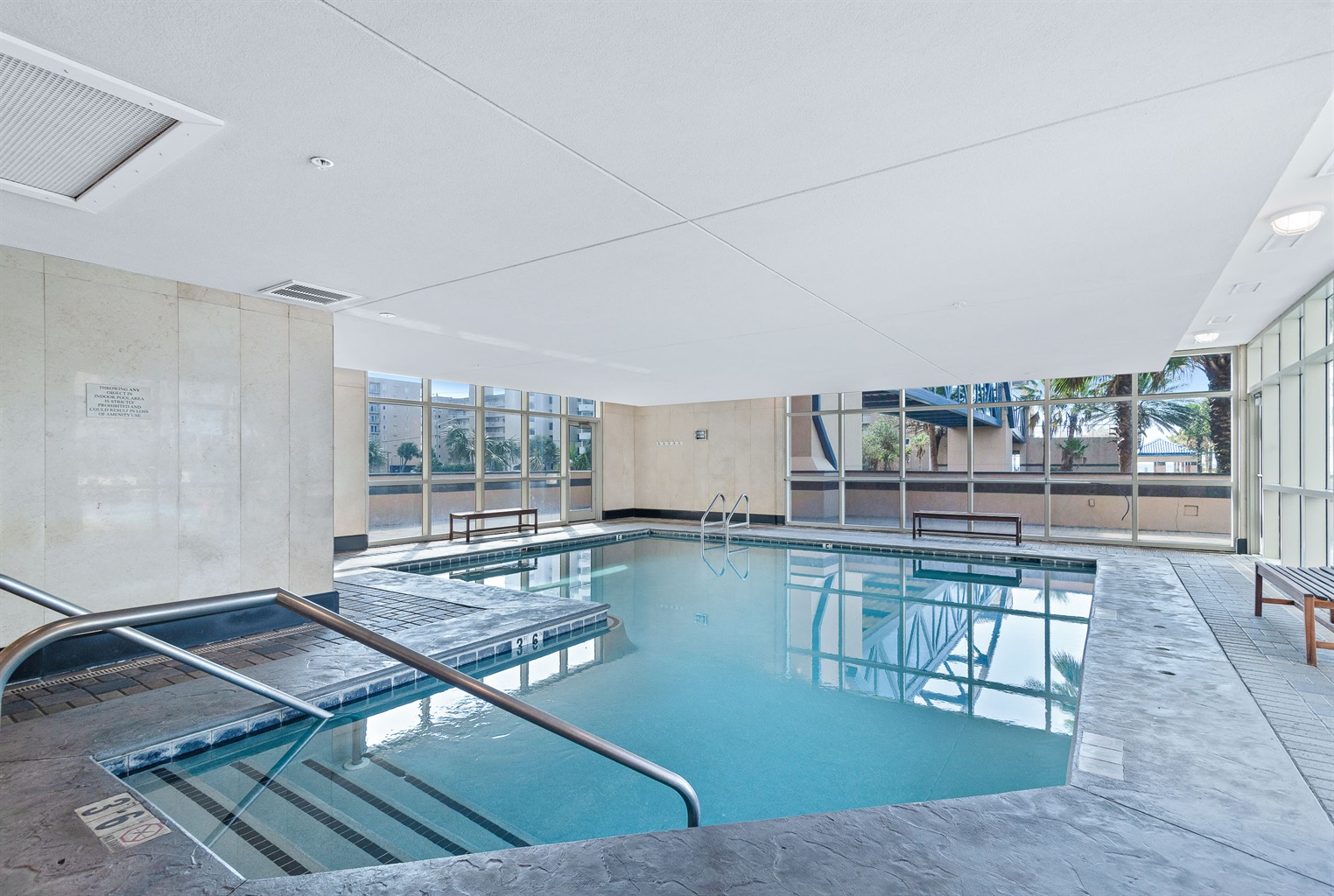Dive into relaxation, no matter the weather. Our heated indoor pool provides a tranquil escape, featuring floor-to-ceiling windows for natural light and stunning views. The perfect place to unwind after a long day.