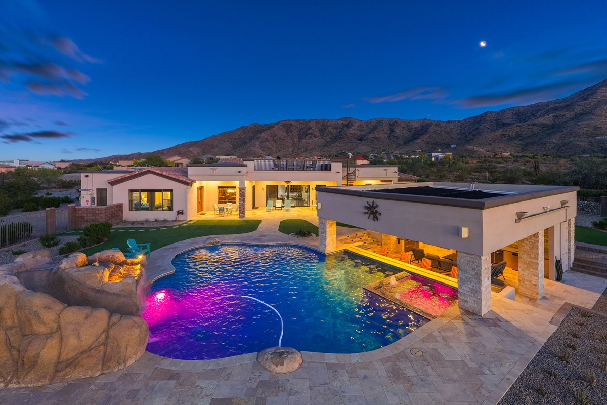 Luxury desert estate with glowing pool, spa, and sunset mountain views — your private Arizona retreat begins here ✨