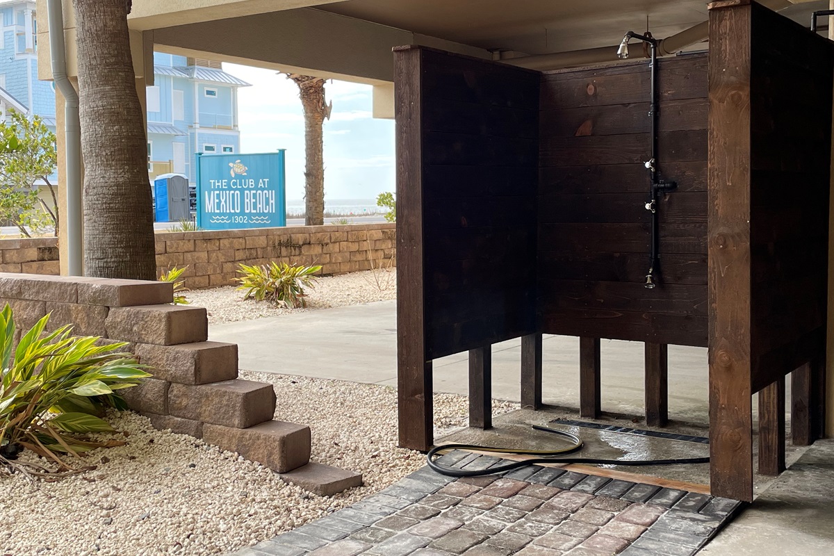 One of 2 outdoor showers. The other is in the pool area.