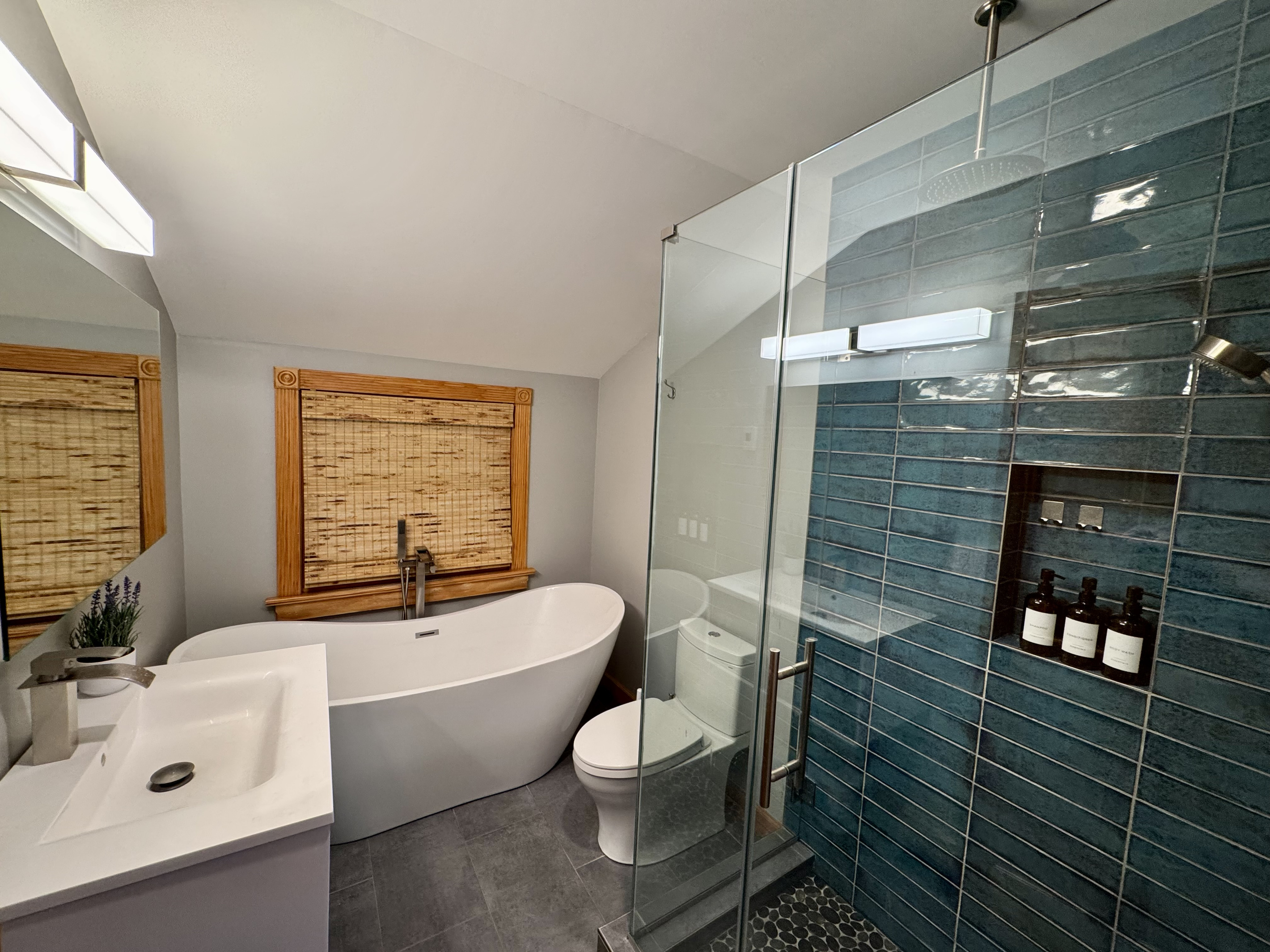 Spa-inspired bathroom with soaking tub and glass shower