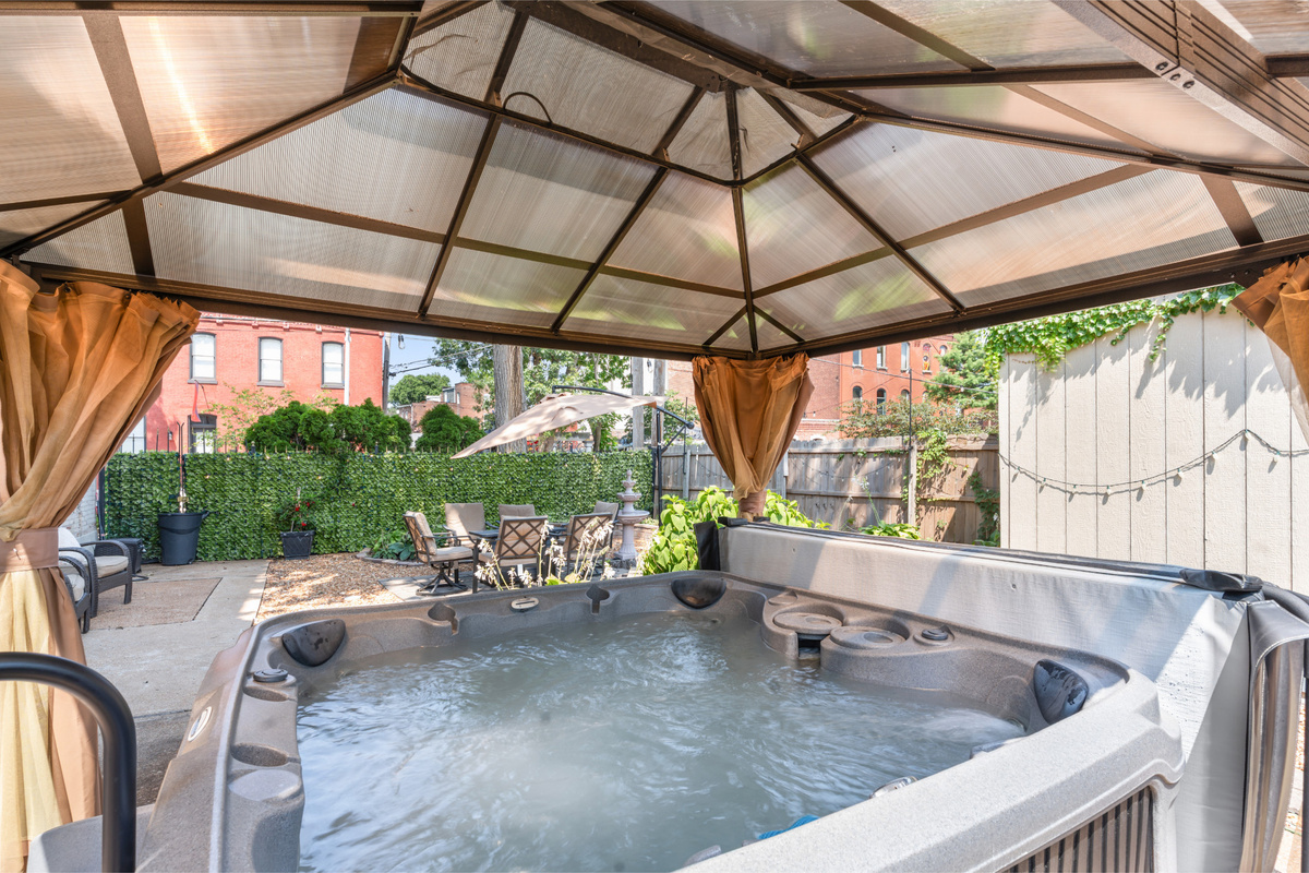 Your own private hot tub, tucked into the backyard and ready for a long soak after exploring St. Louis.