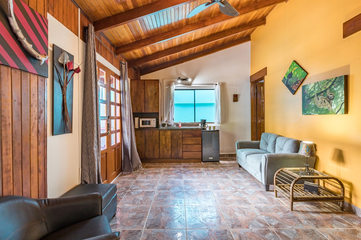 Living room and Kitchette in Cabina Plumeria