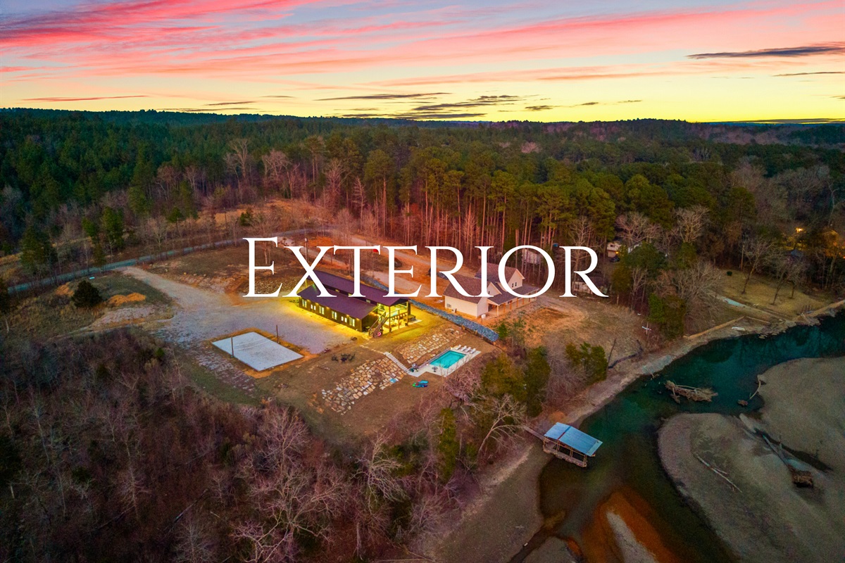 An aerial perspective captures the full layout of the property, showing just how much space there is to spread out and enjoy.