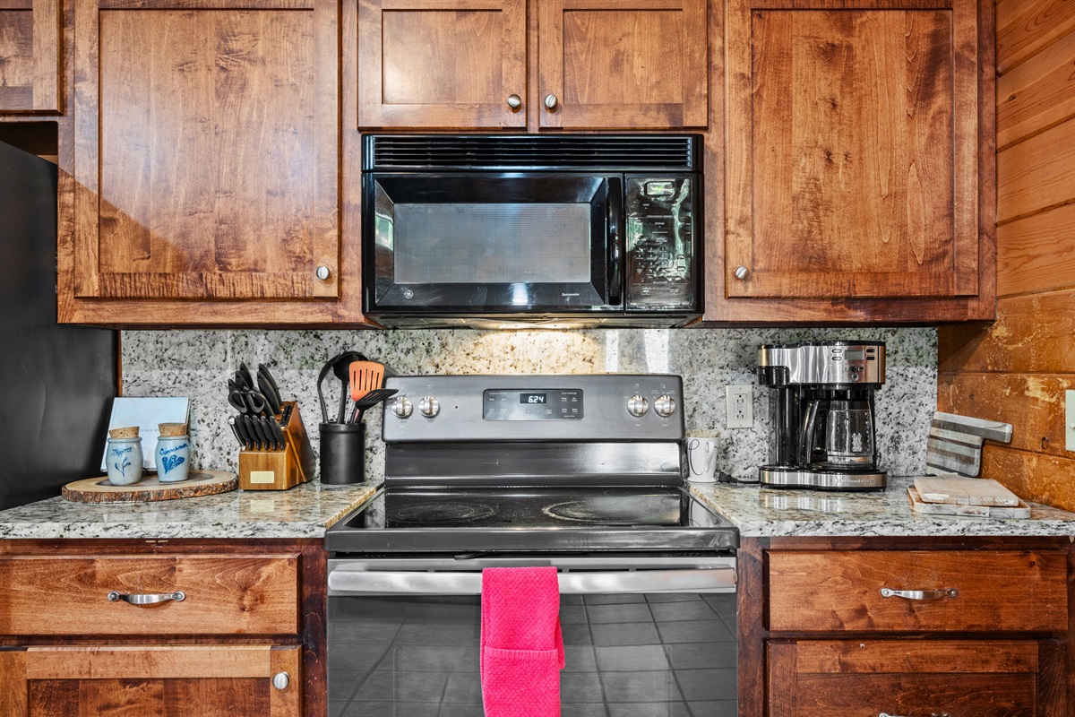 Microwave, coffee maker, and all the tools you need — plus plenty of counter space.