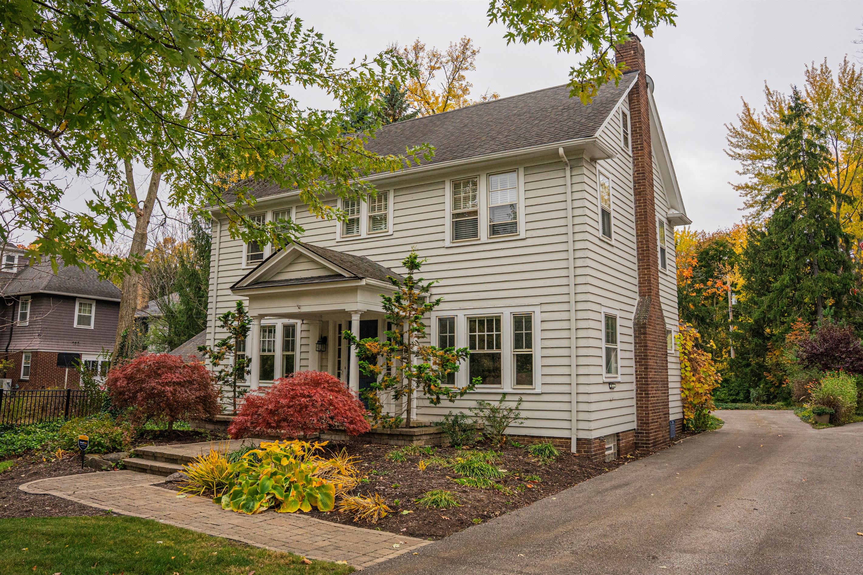 Shared Easement Leads to the Garage in the Backyard.