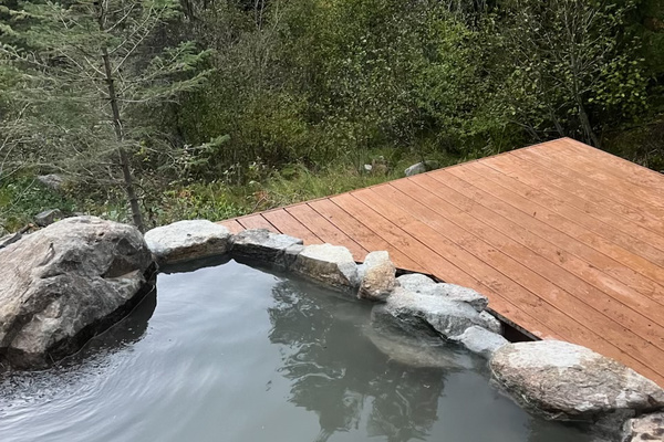 We've built a beautiful deck off your private natural hot springs pool for changing, lounging and star gazing.