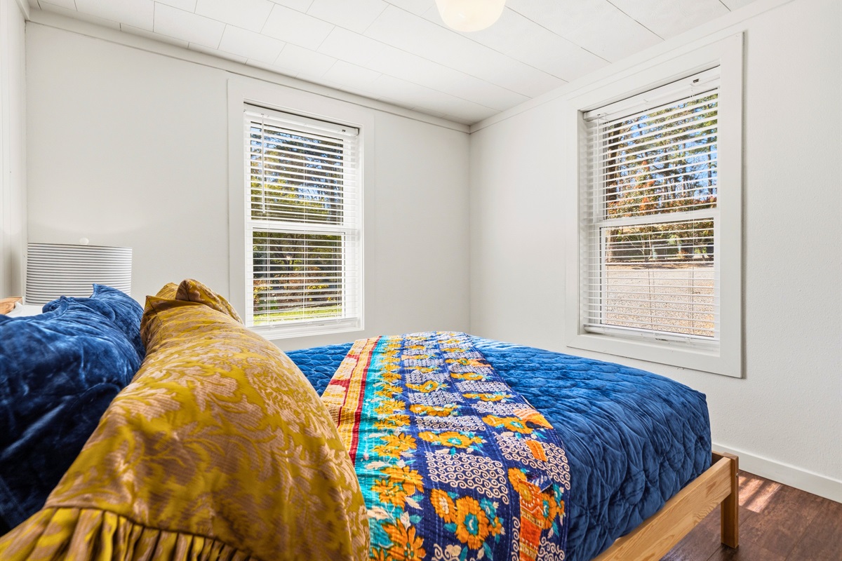 Take in another view of this bedroom that highlights its comfortable layout and inviting feel, perfect for resting and recharging.