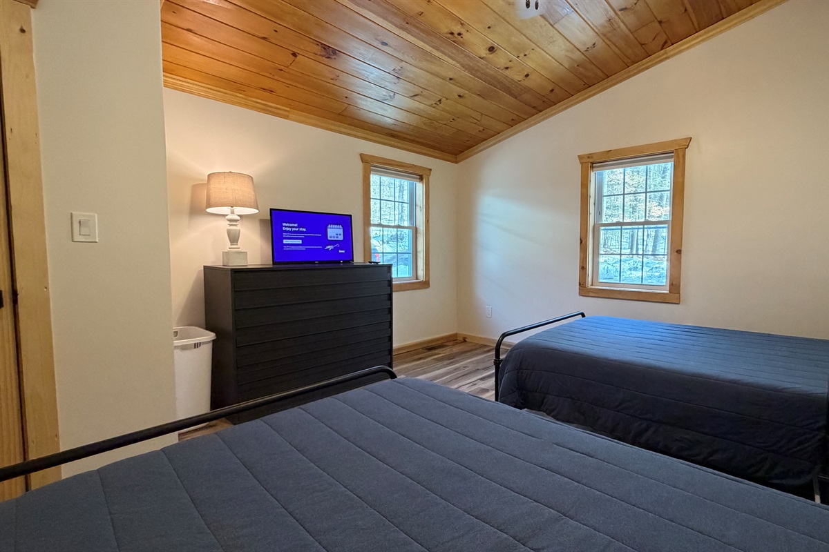 Bedroom with 2 beds and 32" Smart Roku TV - Roku Guest Mode Enabled