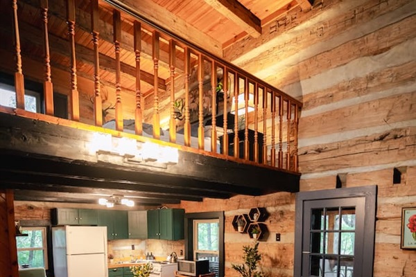 Step inside and enjoy the open loft space – perfect for relaxing in rustic charm.