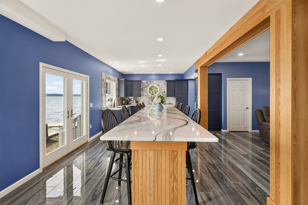 Kitchen island beneath exposed wood beams