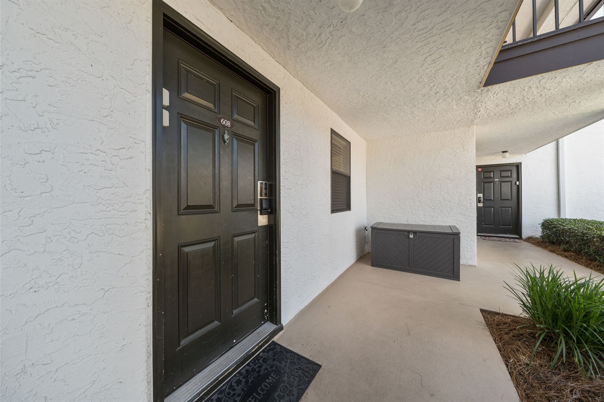 Our front walkway with our stocked outdoor storage bin