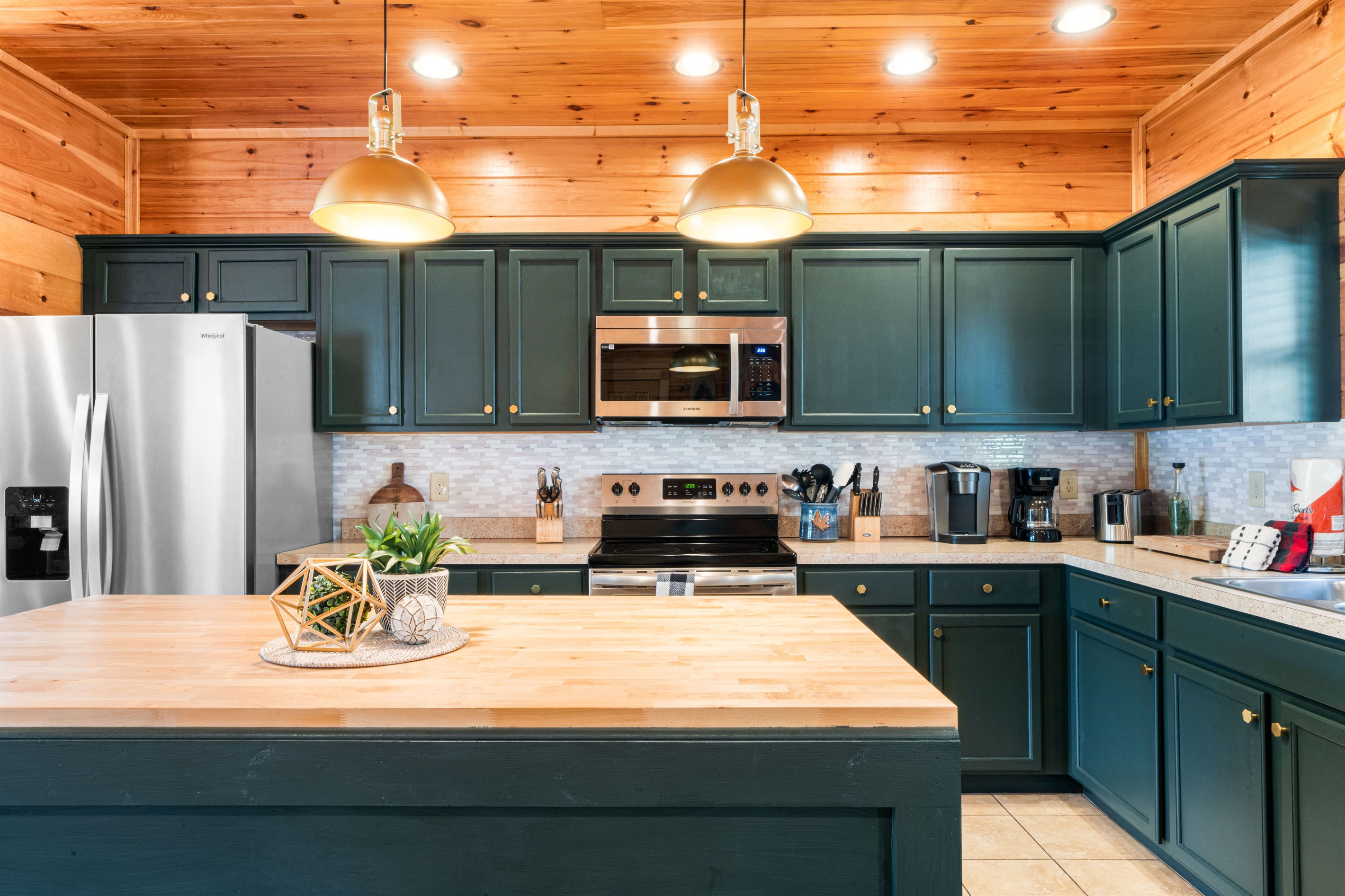 Fully equipped kitchen ready for your group to gather and enjoy time together over meals.