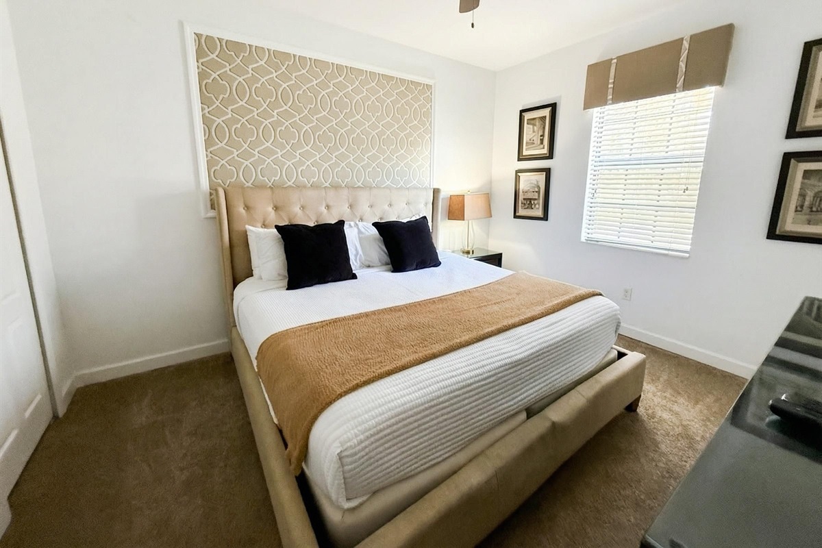 Bedroom 2 - King bedroom downstairs with attached bathroom.