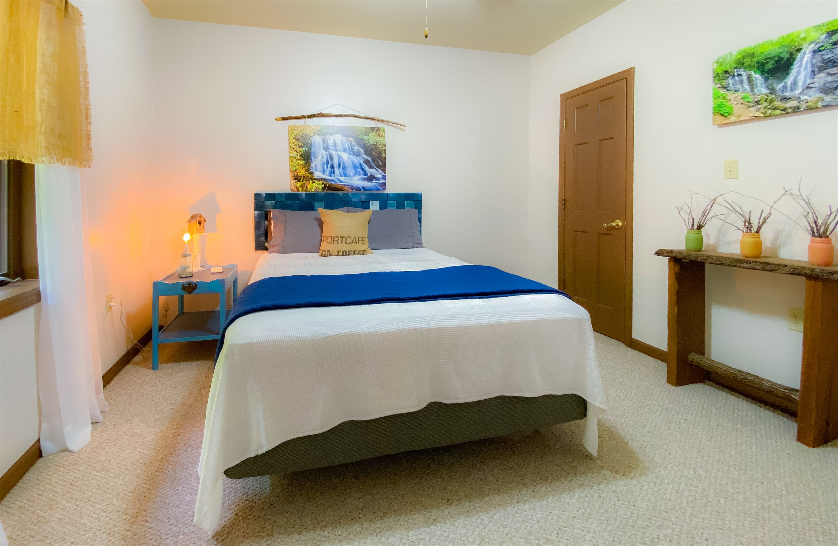 Our local waterfall inspired bedroom at the Hive Lodge. Upon booking you will receive our area guide with all of these waterfall recommendations. 