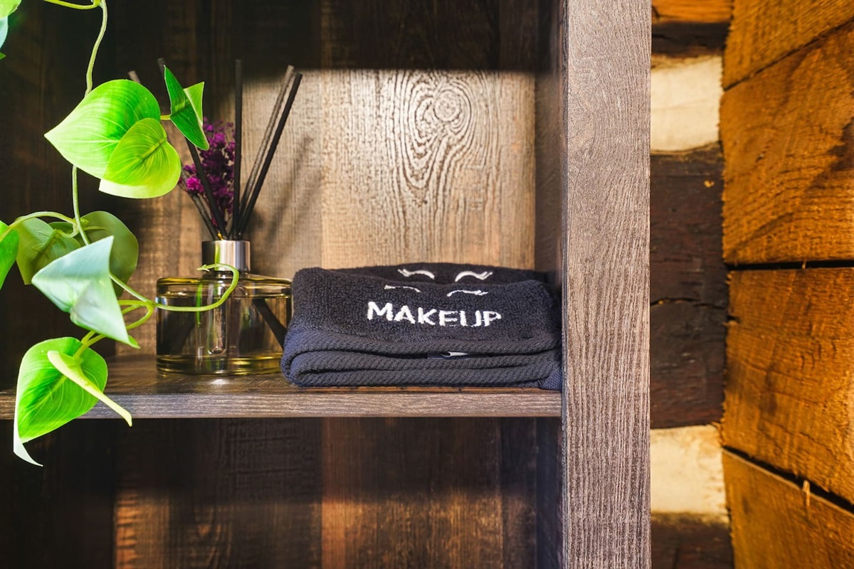 Bathroom bliss with a scent-enhancing diffuser and makeup towels for a refreshing cleanup.