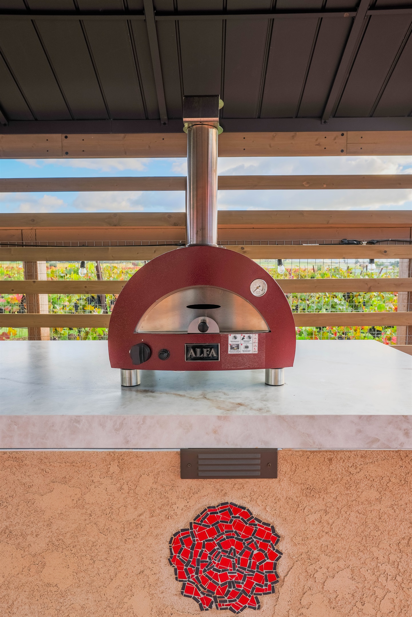 Make our own pizzas in our outdoor pizza oven.