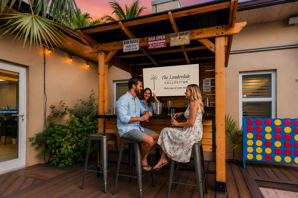 Step into your private entertainment oasis 🍹 — an inviting outdoor bar with a 50” TV, warm lighting, and fun games that set the scene for relaxing and connecting.