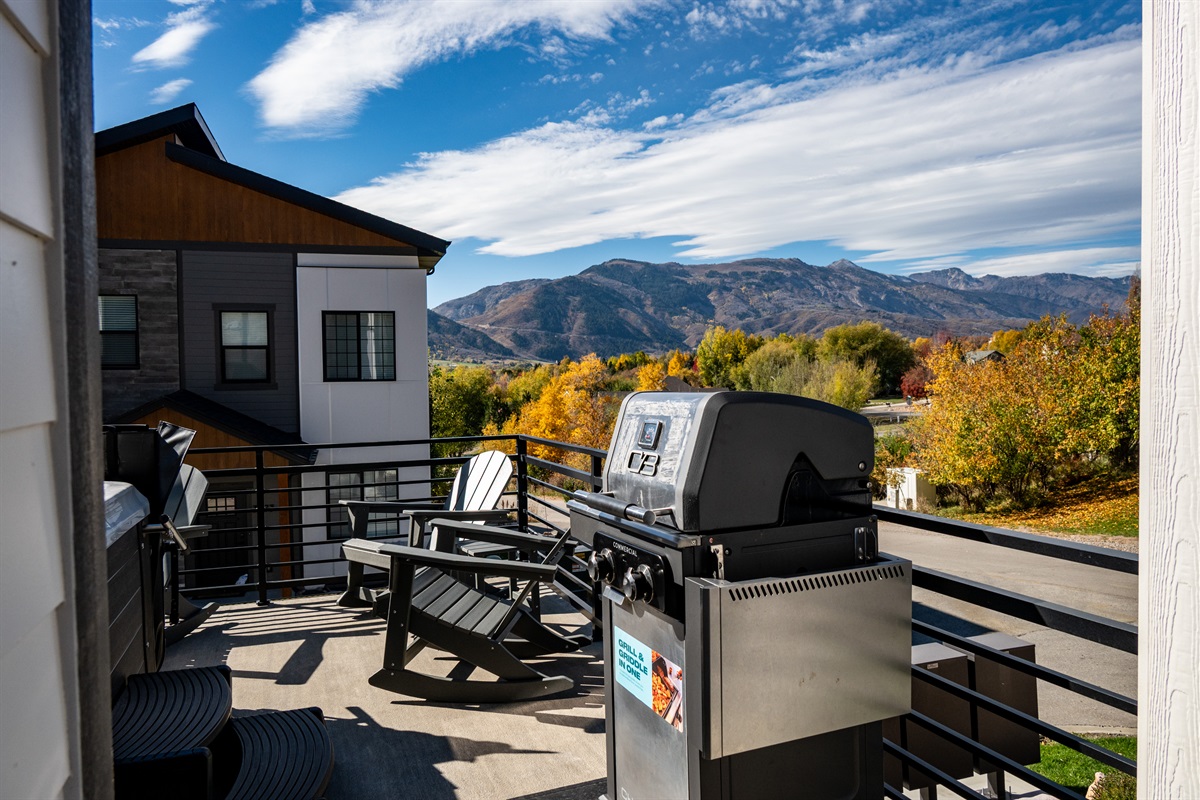Spacious patio and grill area ideal for entertaining.