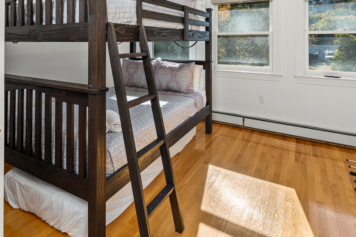 Kids will love the bunk bed in this playful bedroom.