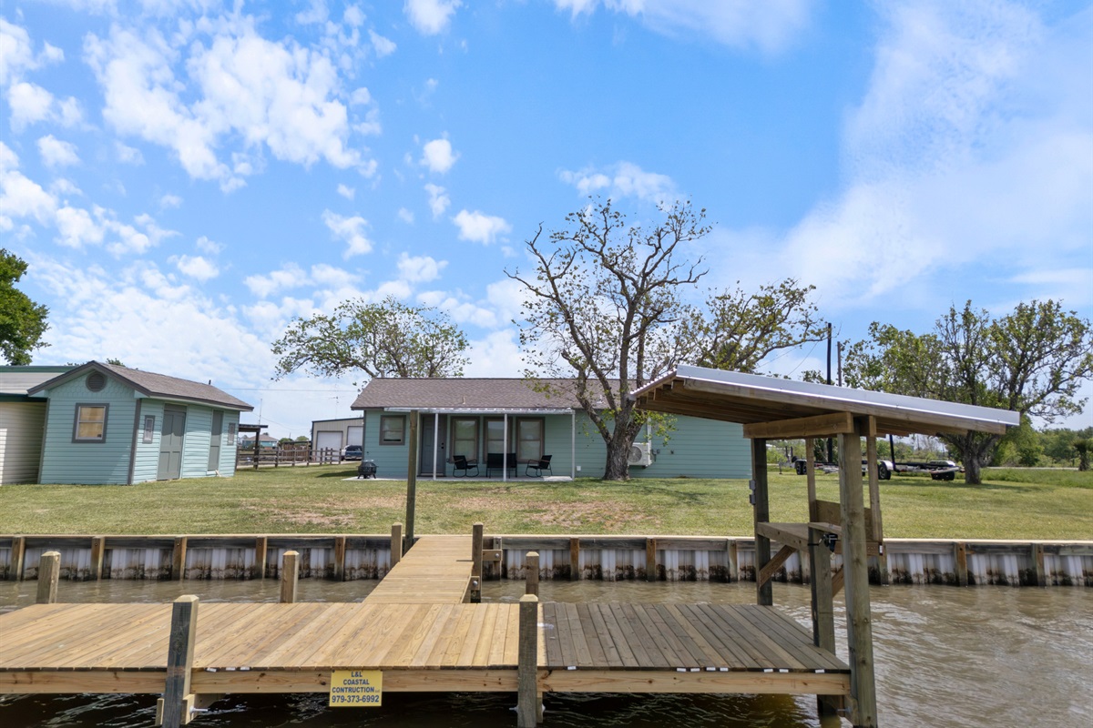 View of pier and backyard from the creek.