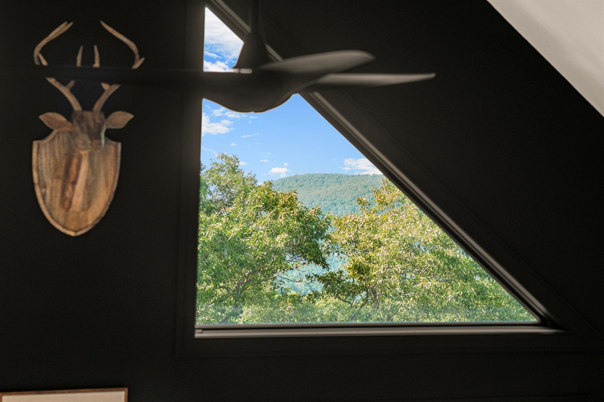 Framed by light and lifted by design — a living space as warm as it is architecturally striking