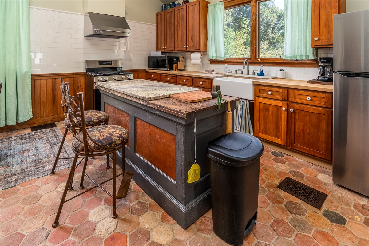Kitchen island with seating for two, perfect for casual meals or morning coffee.