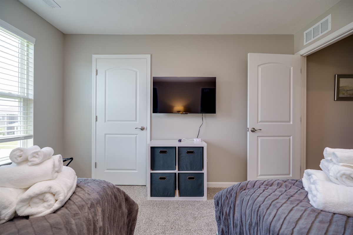 Comfort Meets Entertainment in This Bedroom