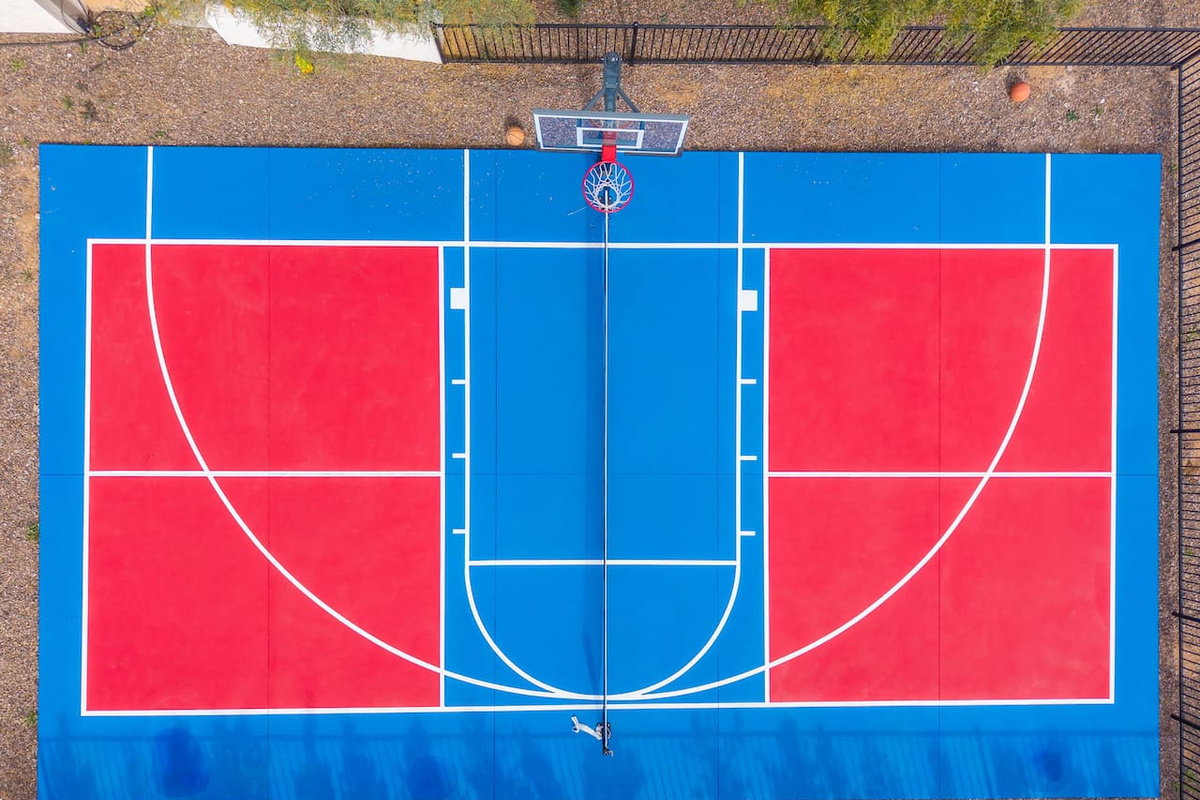 Professional basketball court for competitive games or casual pickup play.