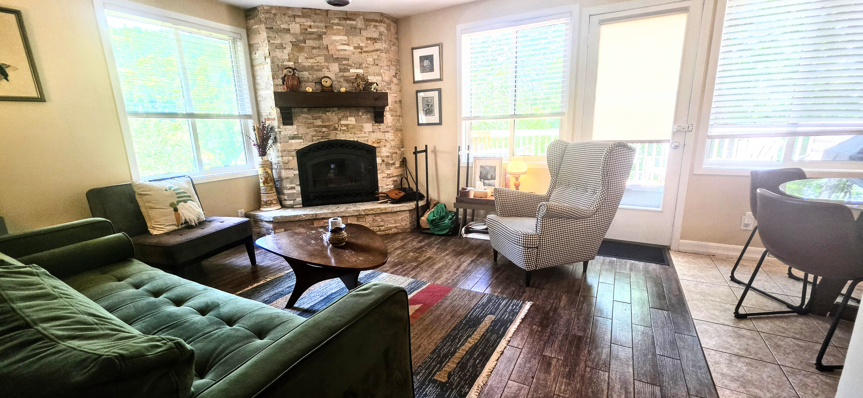 Living room showing fireplace and seating
