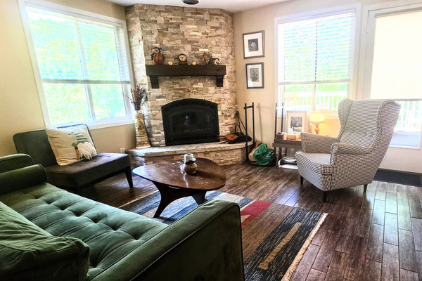 Living room showing fireplace and seating